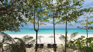 Private beach, white sand, sun loungers, beach umbrellas