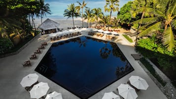 Outdoor pool, open 7:00 AM to 7:00 PM, pool umbrellas, pool loungers