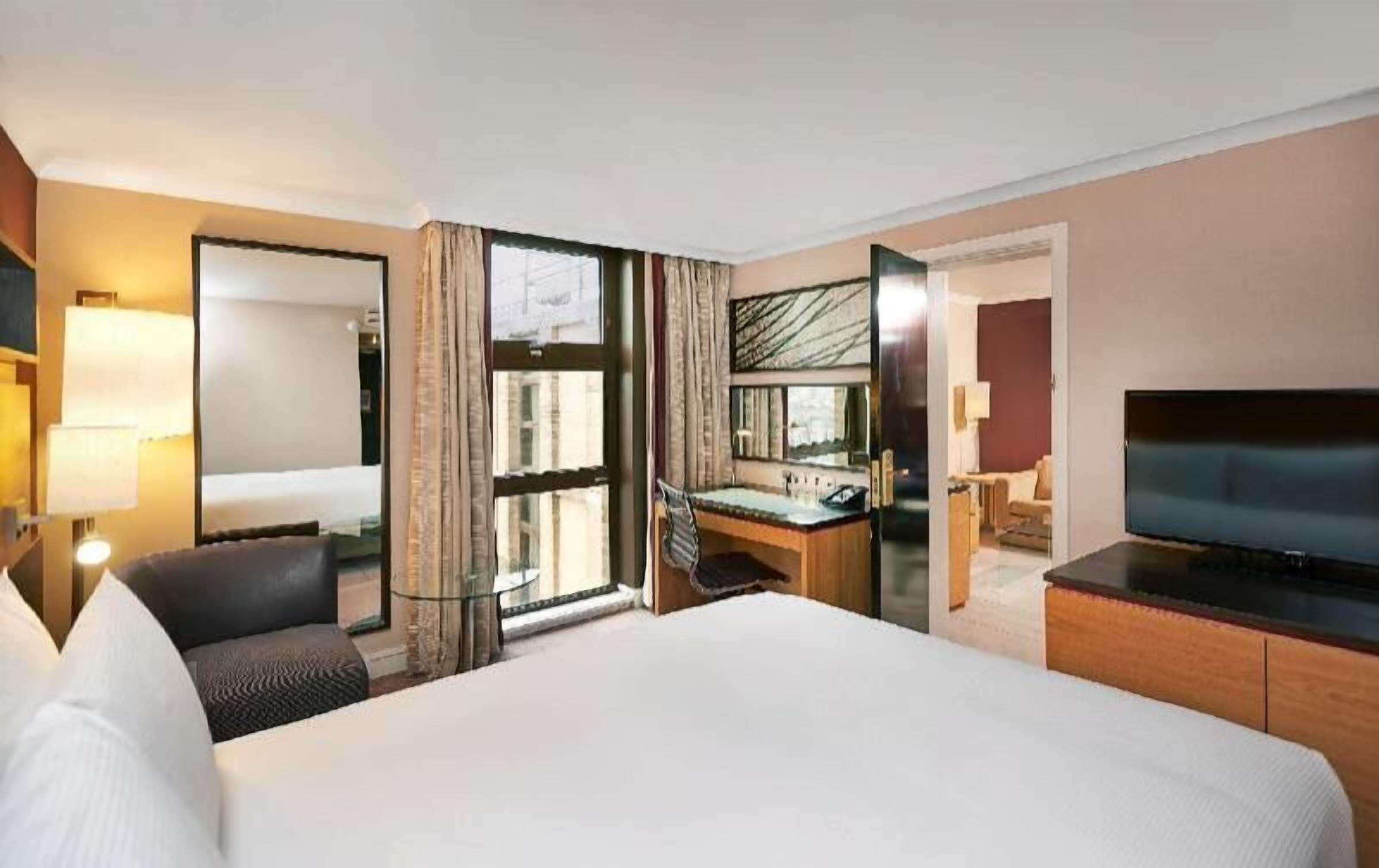Premium bedding, down duvets, in-room safe, desk