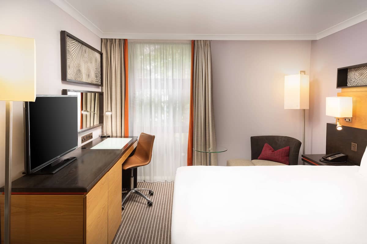Premium bedding, down comforters, in-room safe, desk