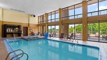 Indoor pool, open 10:00 AM to 10:00 PM, pool loungers