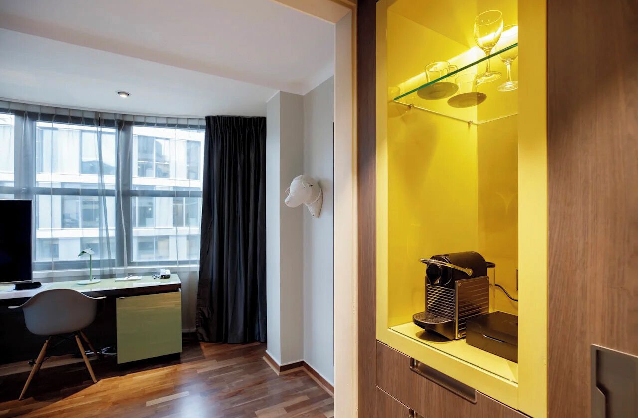 deluxe twin room | premium bedding, minibar, in-room safe, laptop workspace