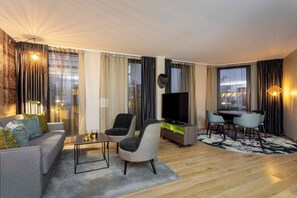 Suite superior | Área de sala de estar | Smart TV 