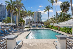 Outdoor pool, pool umbrellas, pool loungers