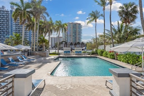 Outdoor pool, pool umbrellas, pool loungers