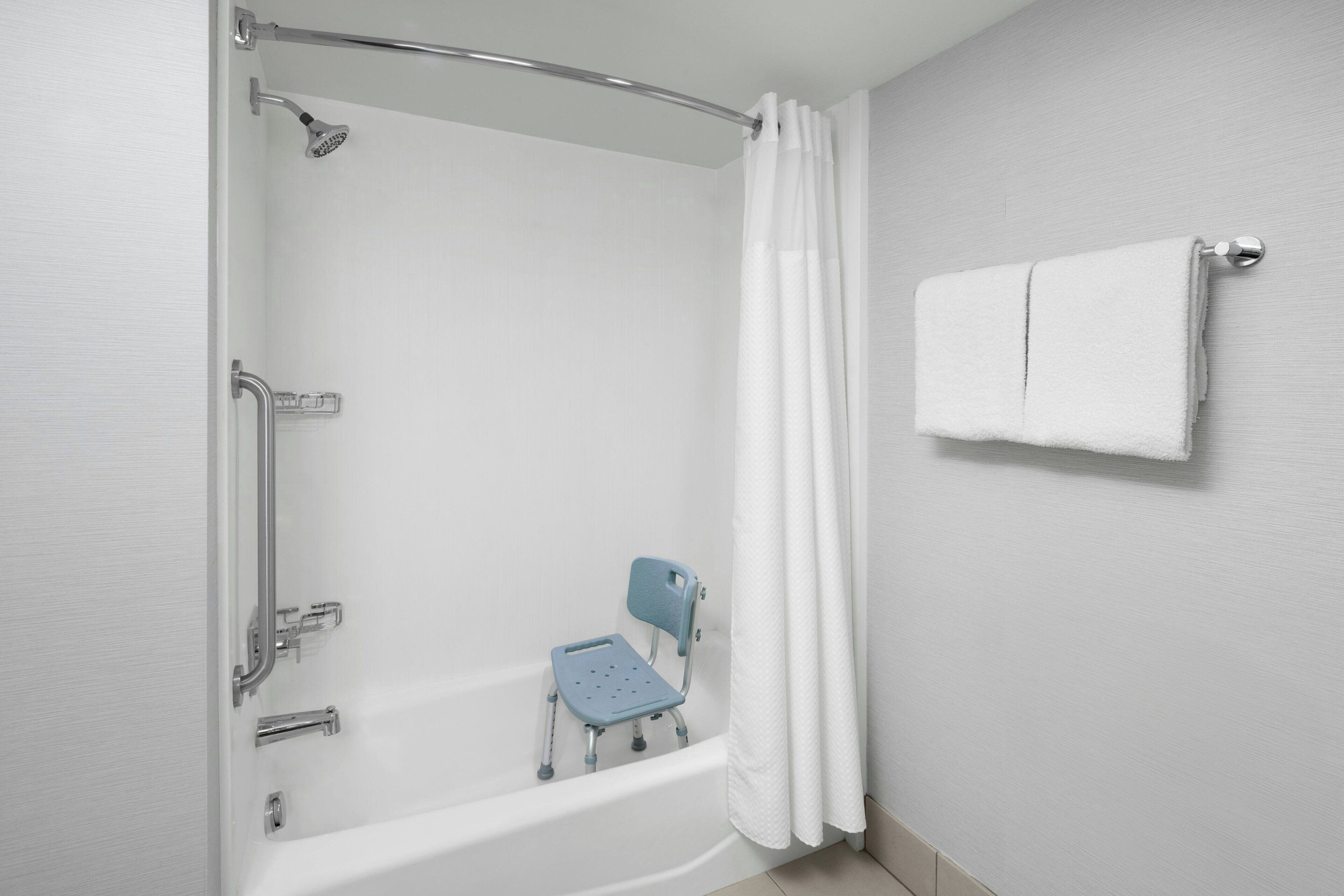 combined shower/bathtub, free toiletries, hair dryer, towels