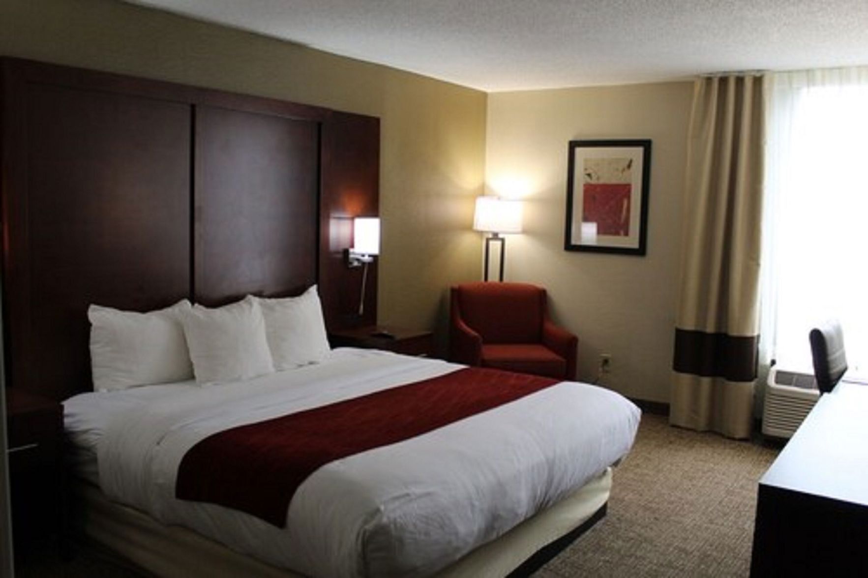 Premium bedding, memory foam beds, desk, laptop workspace