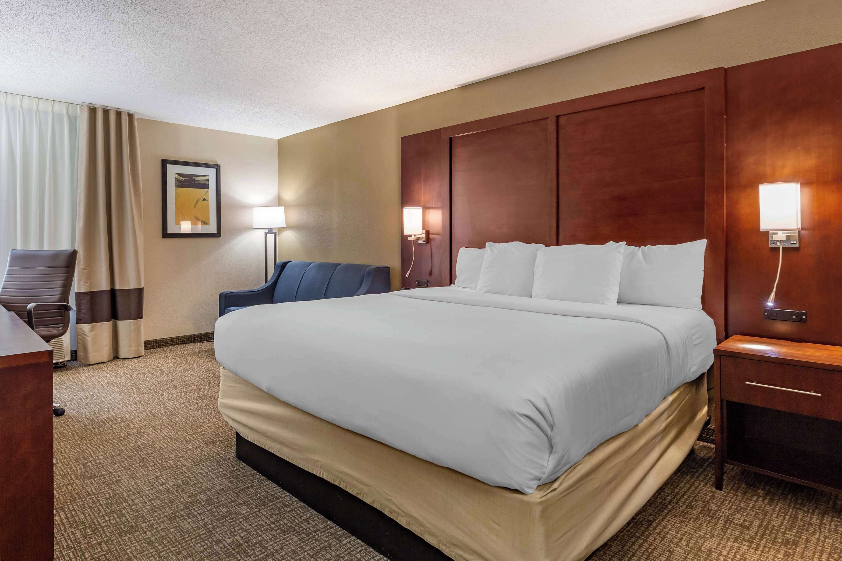 premium bedding, memory-foam beds, desk, laptop workspace