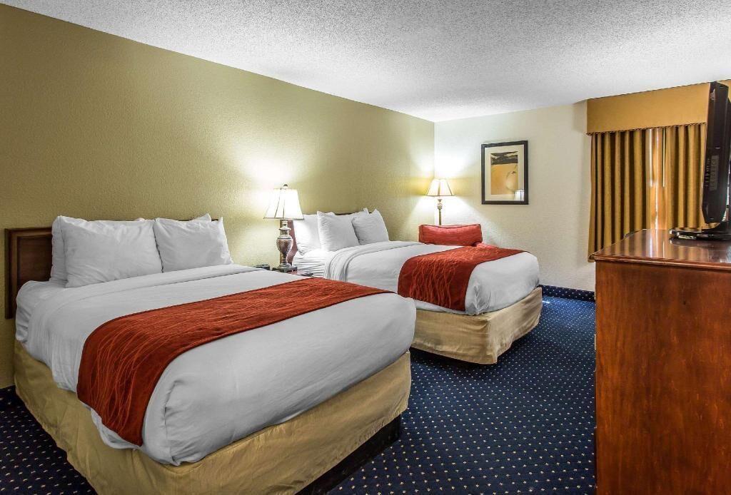 Premium bedding, memory foam beds, desk, laptop workspace