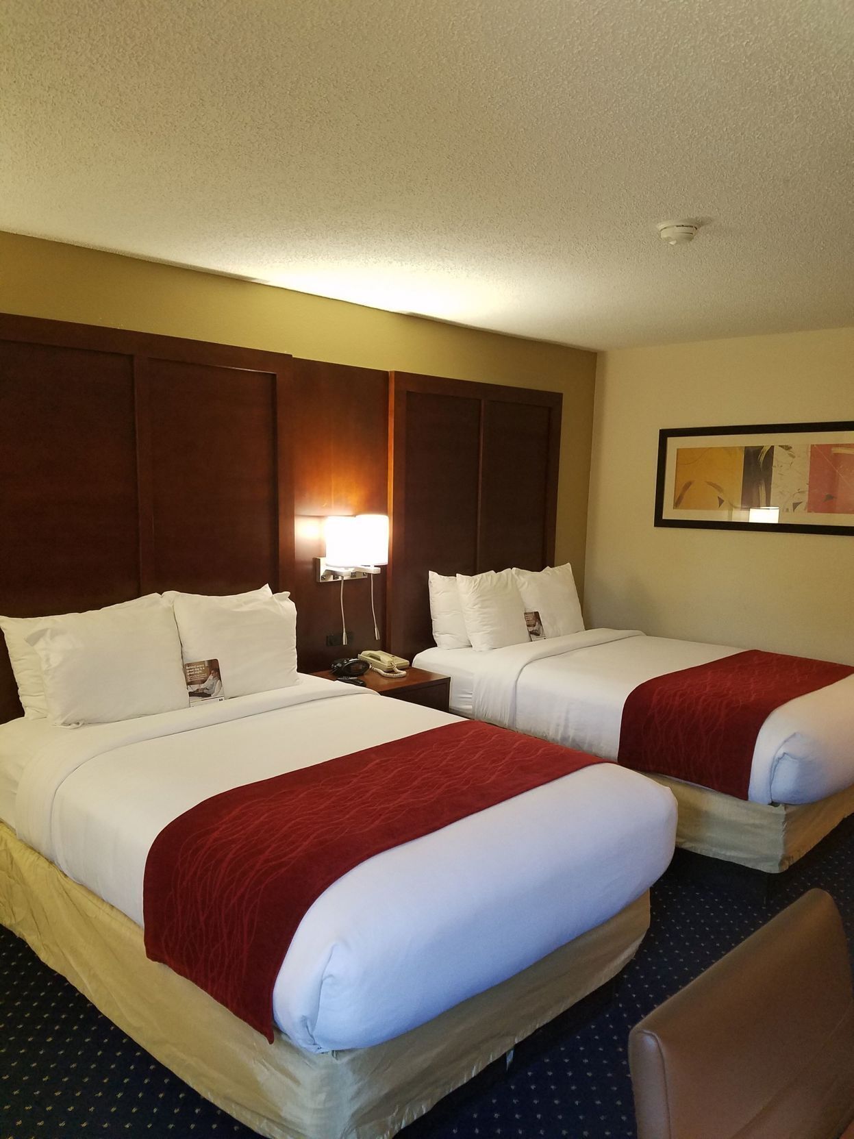 Premium bedding, memory foam beds, desk, laptop workspace