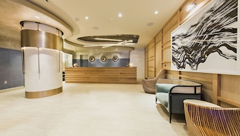 Hotel entrance and lobby at Dream Midtown, by Hyatt