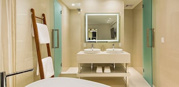 Suite, 1 Bedroom (Guesthouse) | Bathroom | Shower, designer toiletries, hair dryer, bathrobes at Dream Midtown, by Hyatt