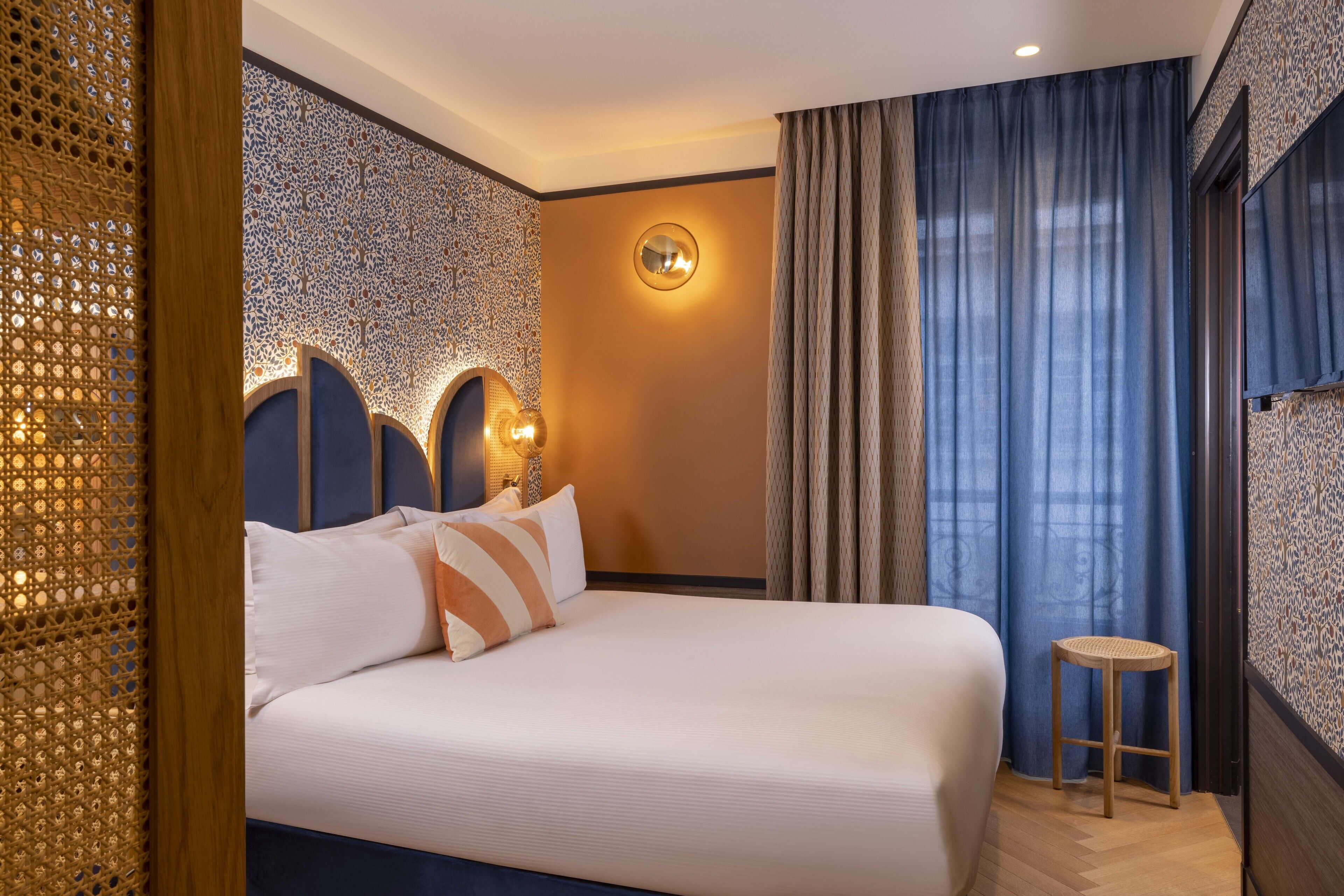 classic double room | minibar, in-room safe, individually decorated, desk