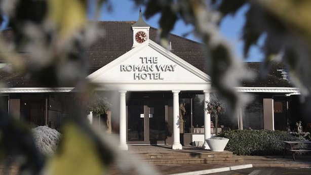 The Roman Way Hotel with a classic architectural style, featuring a prominent entrance with columns and a clock tower. - Roman Way Hotel A5 Cannock (Cannock)