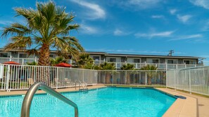 Outdoor pool, pool umbrellas, sun loungers