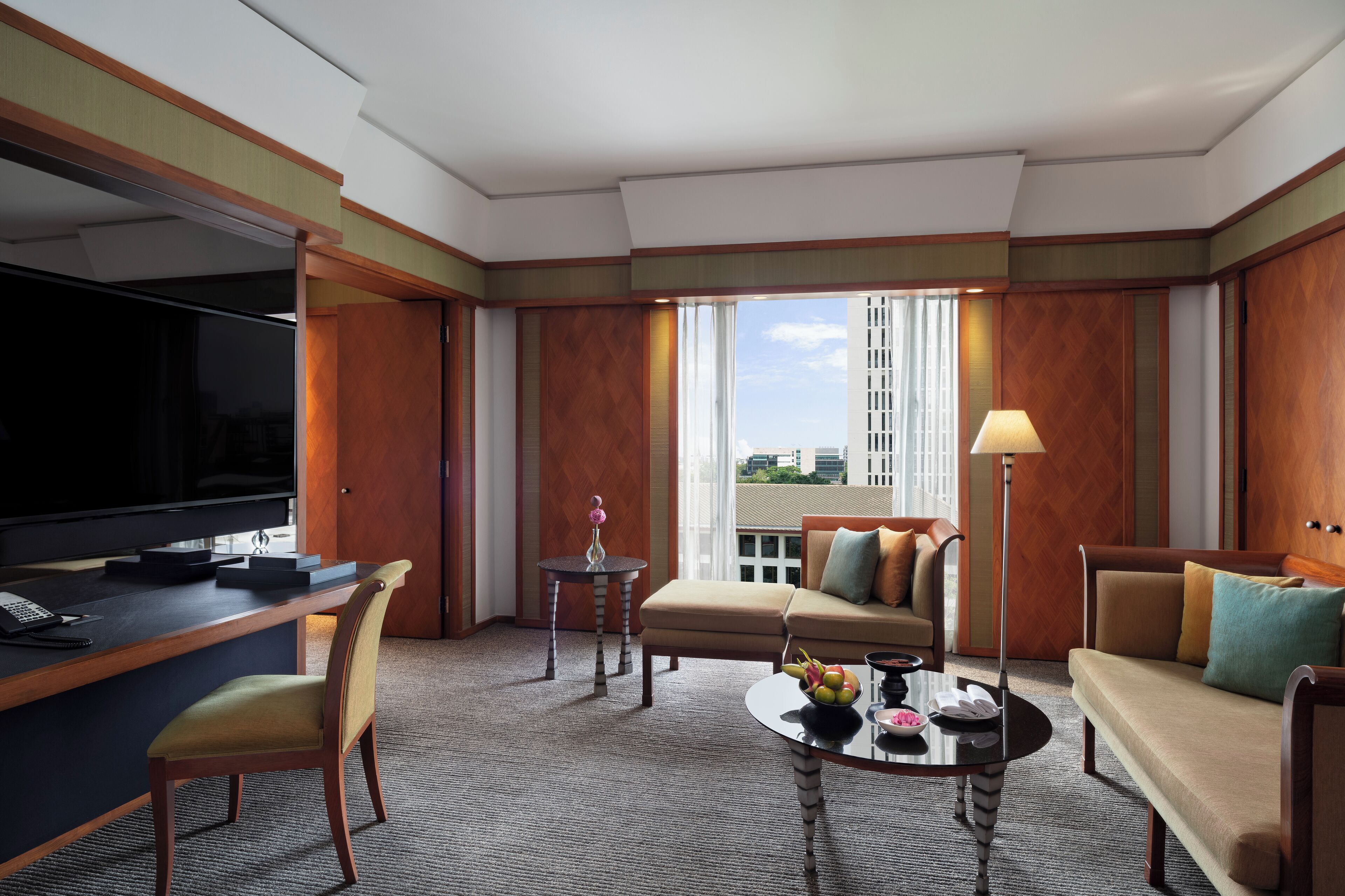 deluxe suite with club benefit | living area | 40-inch led tv with digital channels, tv