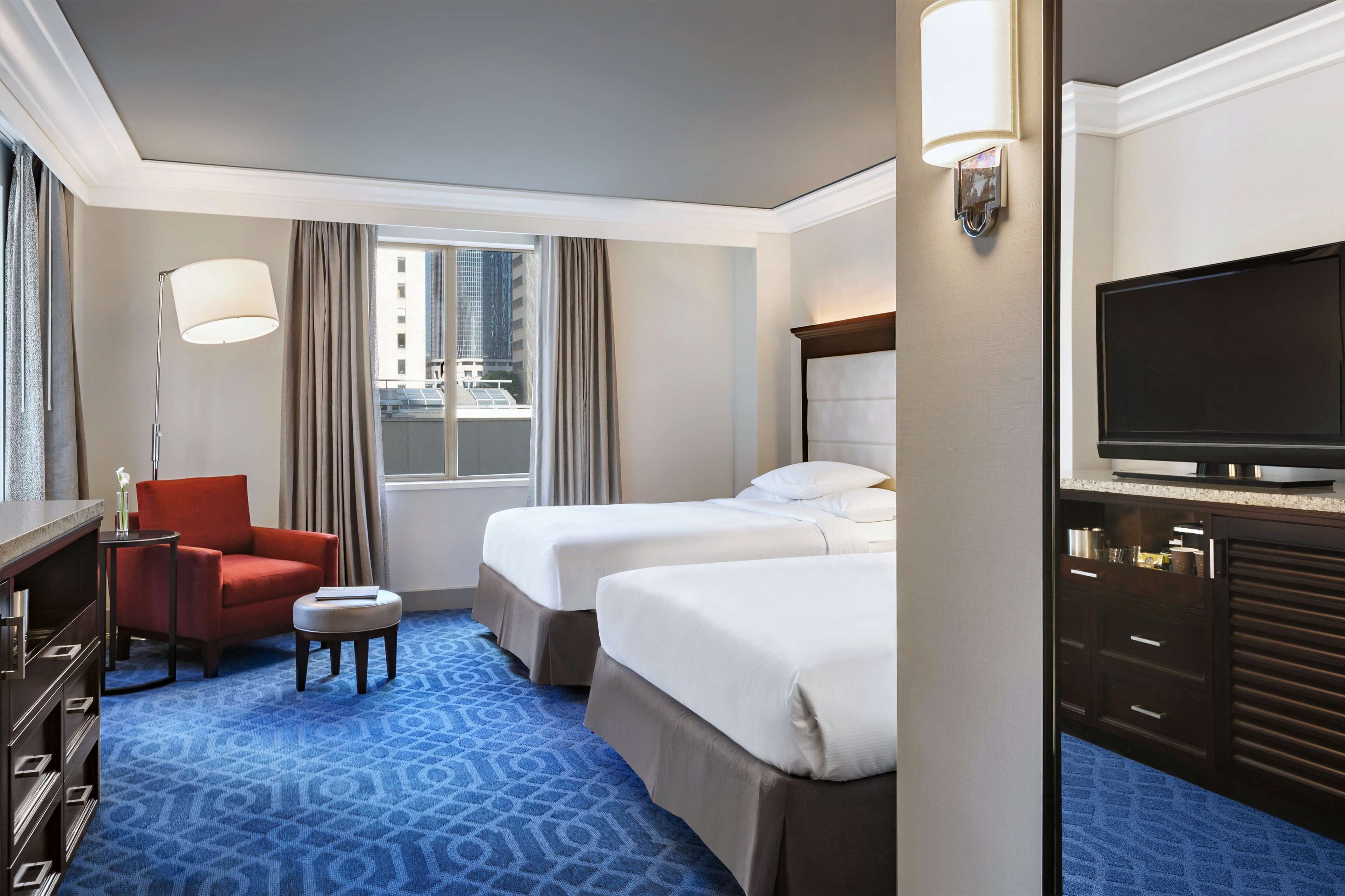 Premium bedding, down comforters, in-room safe, desk