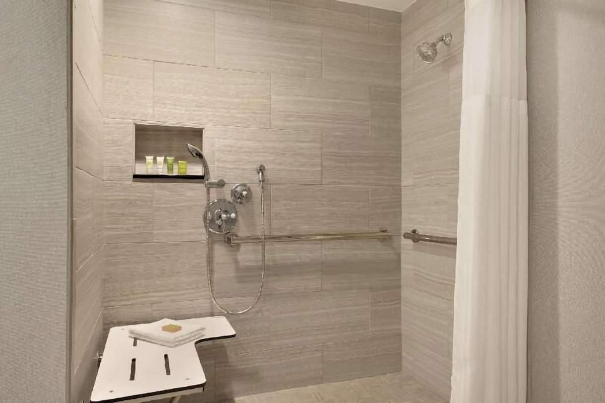 Bathroom | Designer toiletries, hair dryer, towels