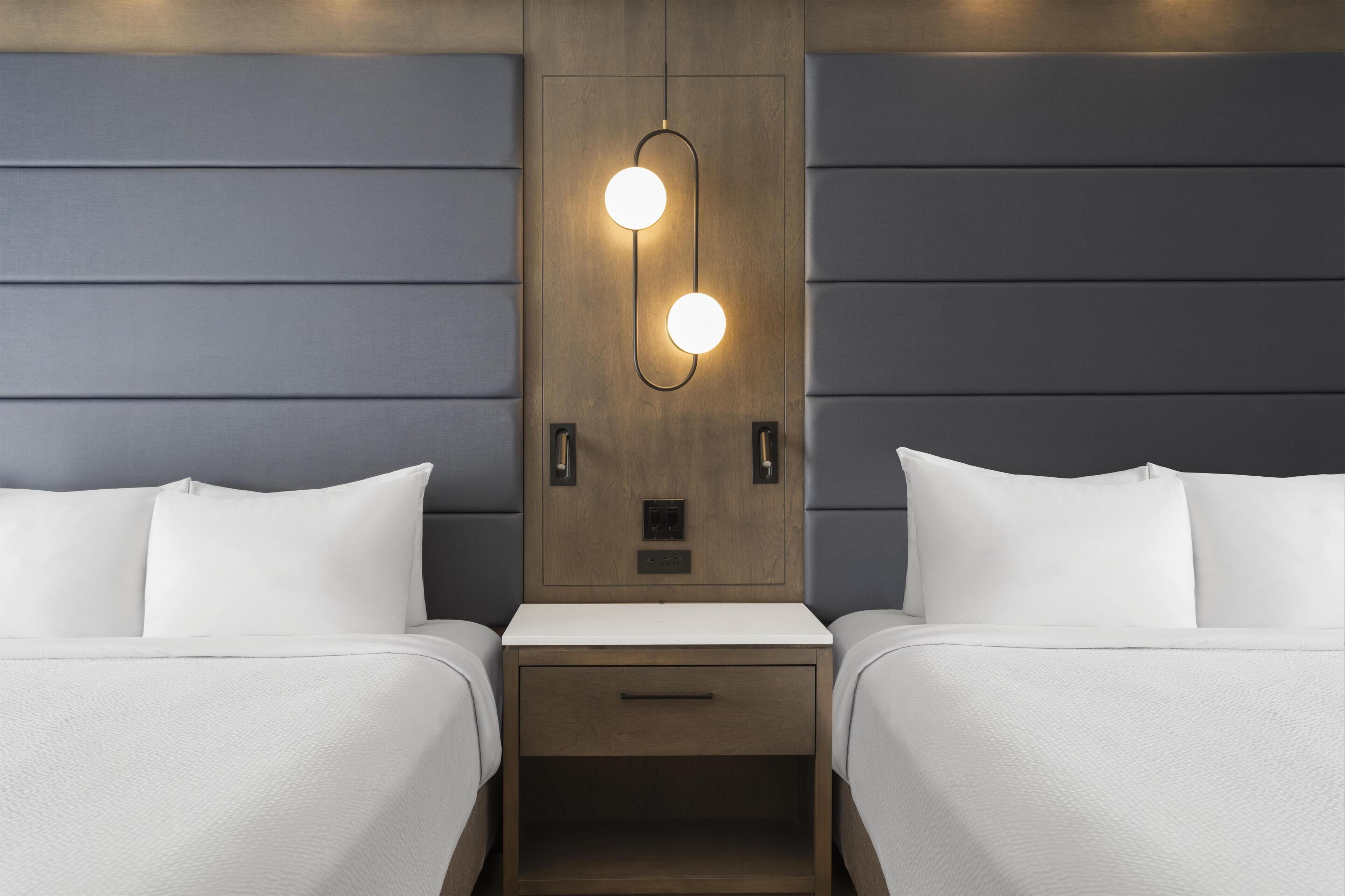 Hypo-allergenic bedding, down comforters, in-room safe, desk