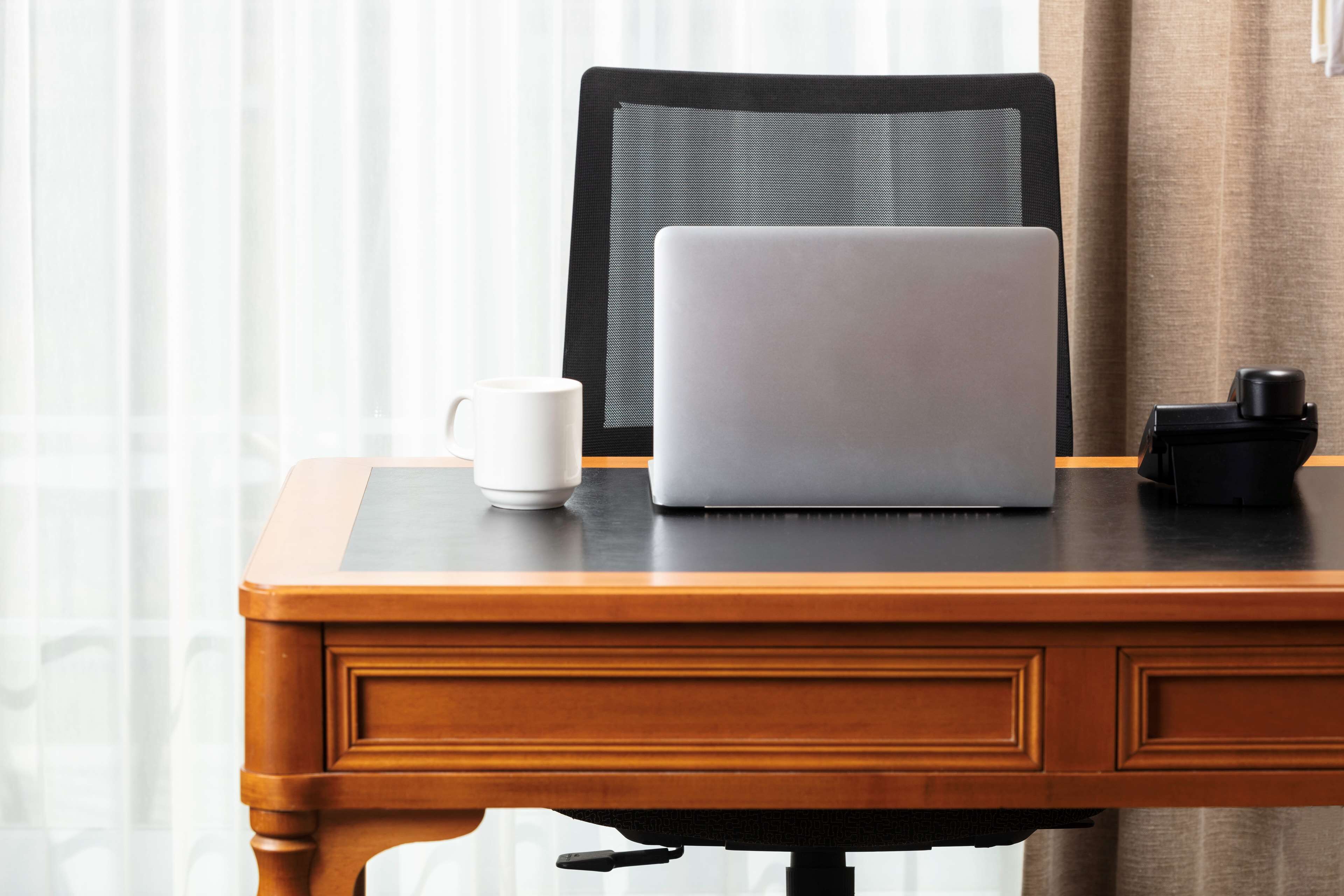 hypo-allergenic bedding, down duvets, in-room safe, desk