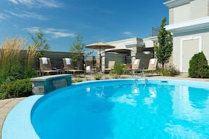 Seasonal outdoor pool, pool umbrellas, sun loungers