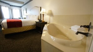 Chambre Deluxe, 1 très grand lit, bain à remous