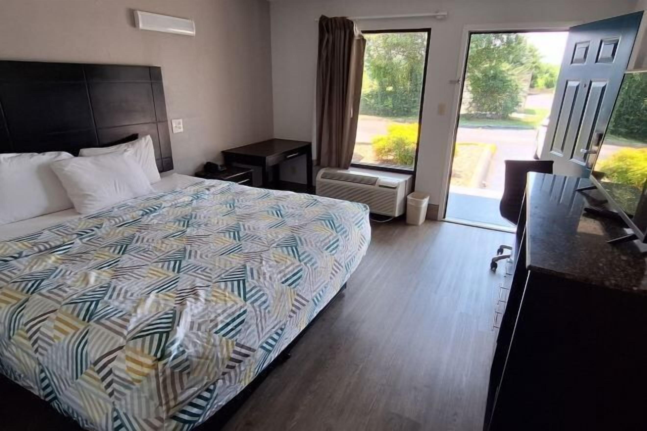 Premium bedding, desk, blackout drapes, iron/ironing board