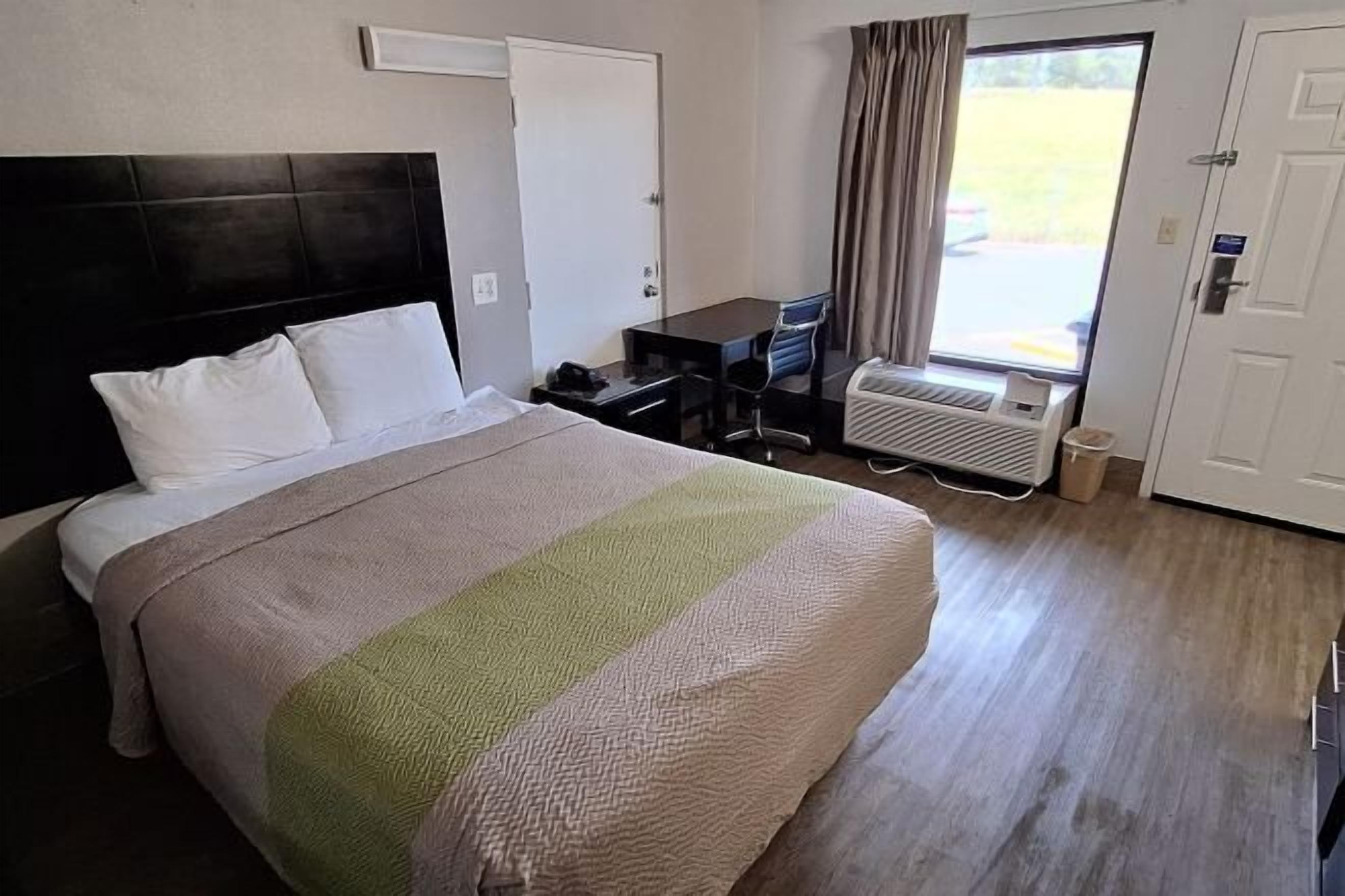 Premium bedding, desk, blackout drapes, iron/ironing board