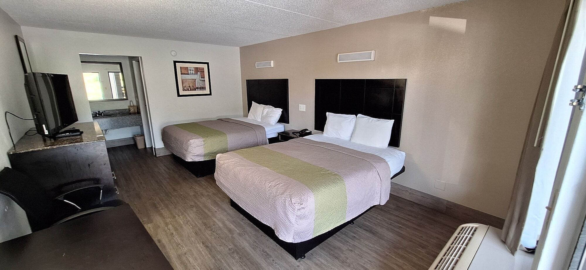 Premium bedding, desk, blackout drapes, iron/ironing board