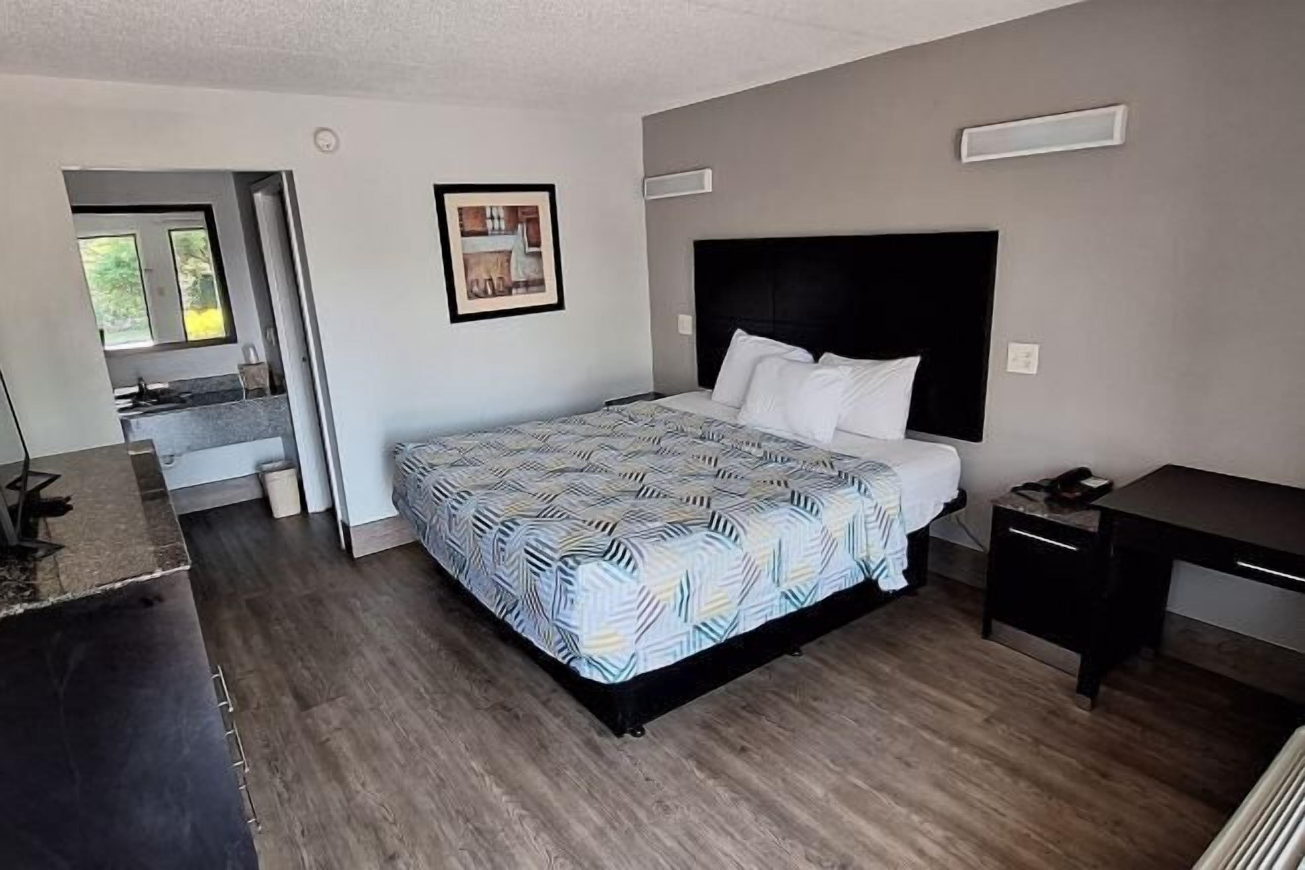 Premium bedding, desk, blackout drapes, iron/ironing board