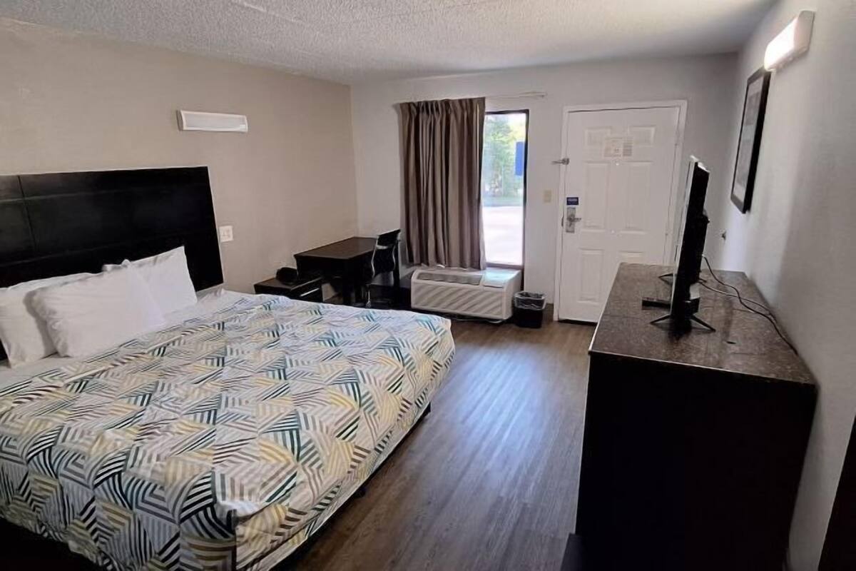 Premium bedding, desk, blackout curtains, iron/ironing board