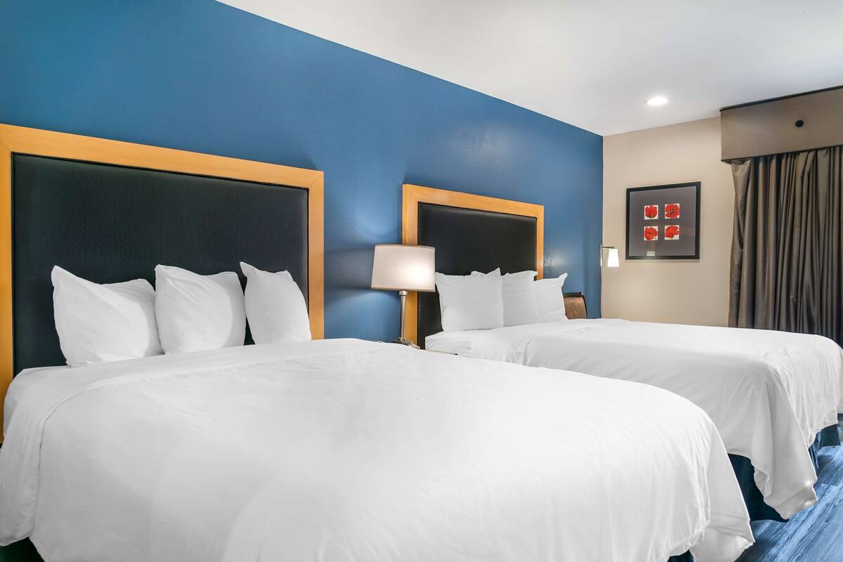 standard room, 2 queen beds, balcony, river view (interior room access) | iron/ironing board, bed sheets