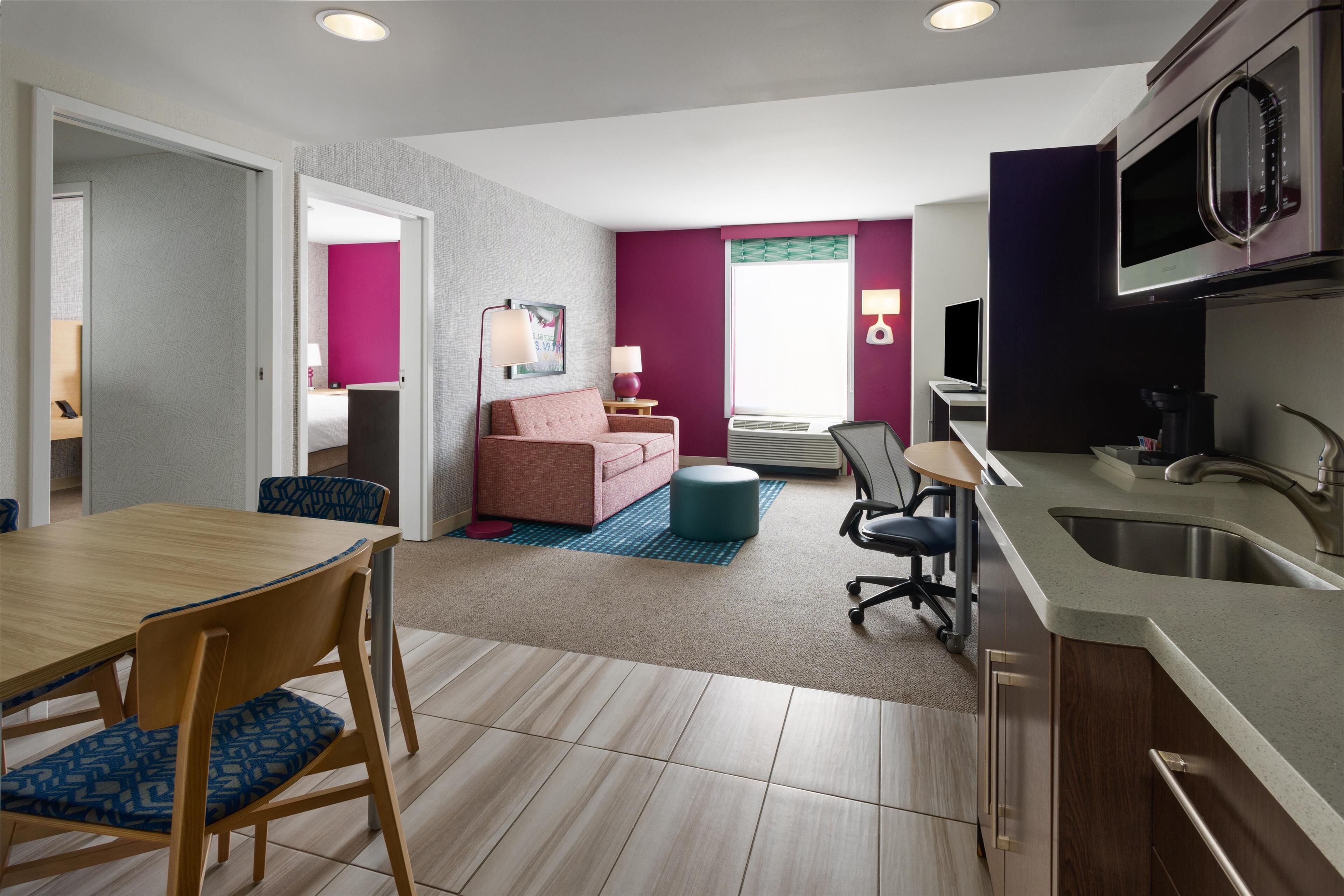 suite, 1 king bed, non smoking | living area | 43-inch flat-screen tv with cable channels, tv