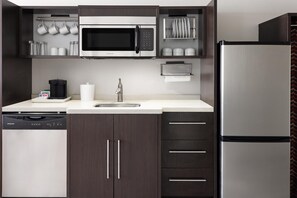 Suite, 1 King Bed, Non Smoking | Private kitchen | Fridge, microwave, dishwasher, cookware/dishes/utensils
