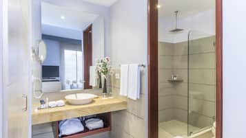 Shower, rainfall showerhead, hair dryer, towels