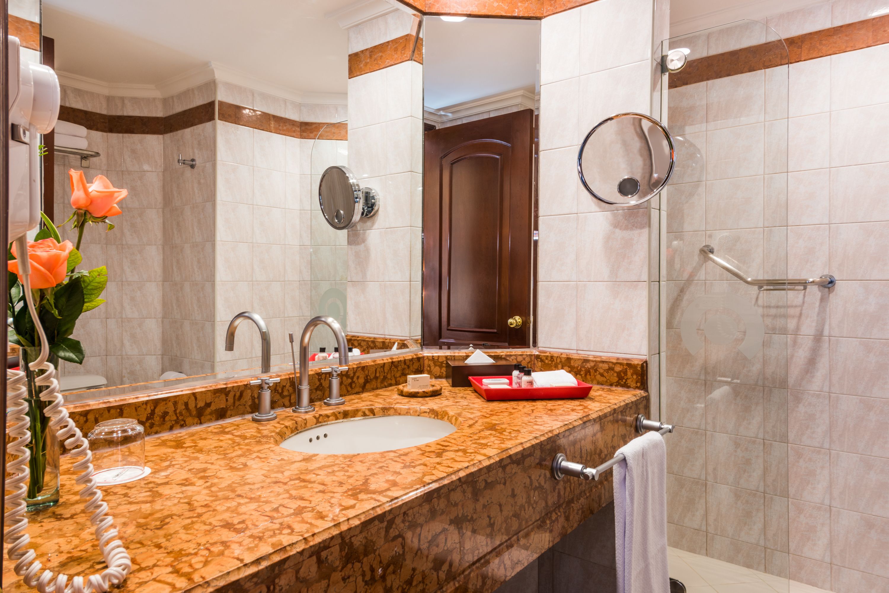 shower, rainfall showerhead, hair dryer, towels