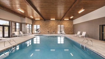 Indoor pool, seasonal outdoor pool, pool umbrellas, pool loungers