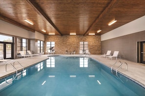 Indoor pool, seasonal outdoor pool, pool umbrellas, pool loungers