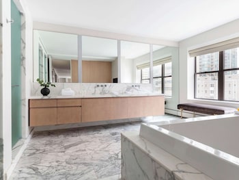 Designer toiletries, hair dryer, bathrobes, slippers at 21c Museum Hotel Chicago