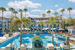 Outdoor pool, open 10:00 AM to 10:00 PM, pool umbrellas, sun loungers