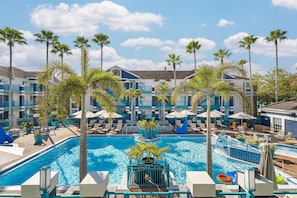 Outdoor pool, open 10:00 AM to 10:00 PM, pool umbrellas, pool loungers