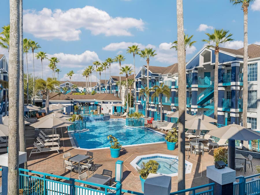Outdoor pool, open 10:00 AM to 10:00 PM, pool umbrellas, pool loungers