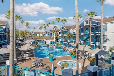 Outdoor pool, open 10:00 AM to 10:00 PM, pool umbrellas, sun loungers
