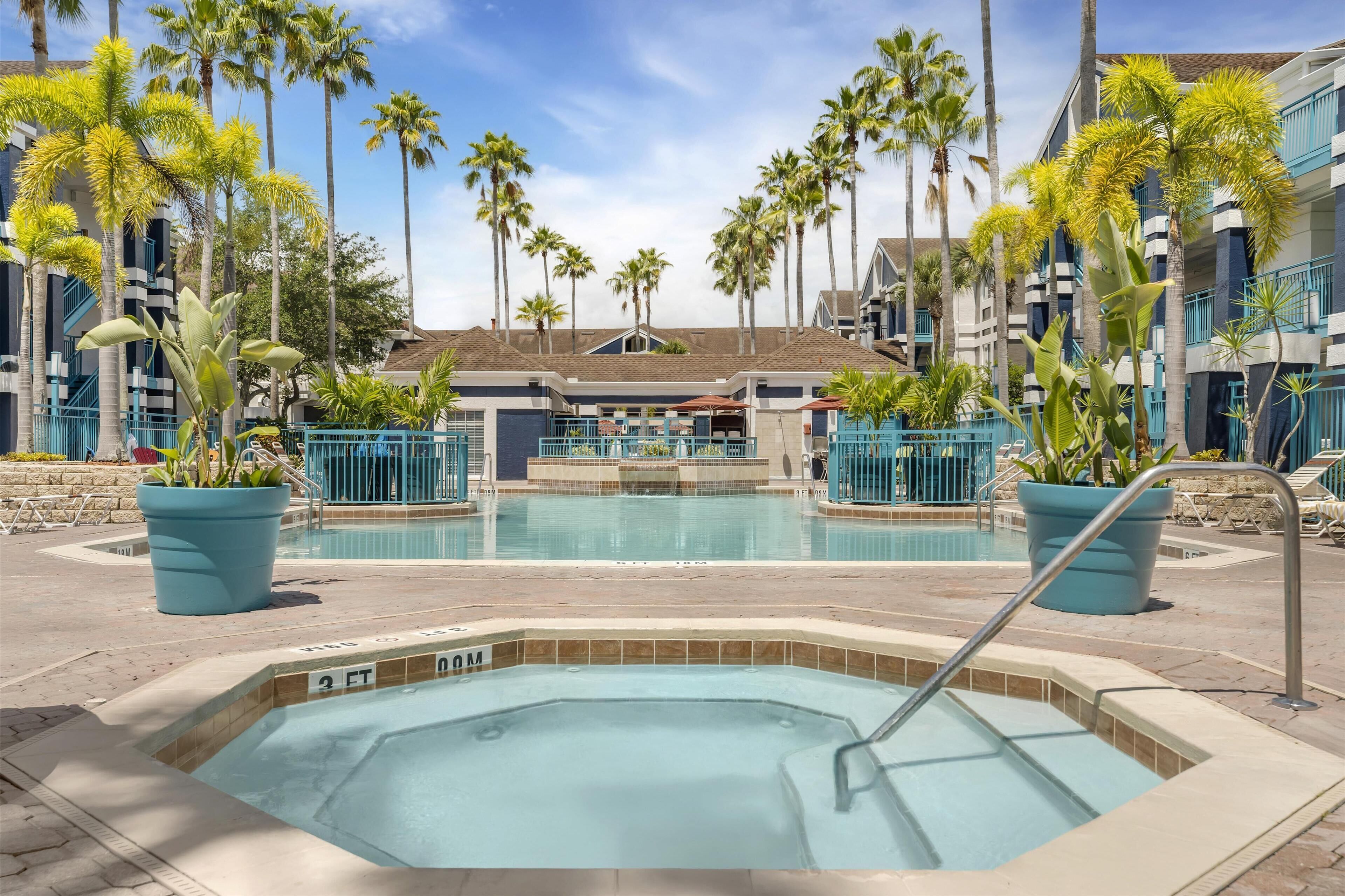 Outdoor pool, open 10:00 AM to 10:00 PM, pool umbrellas, pool loungers