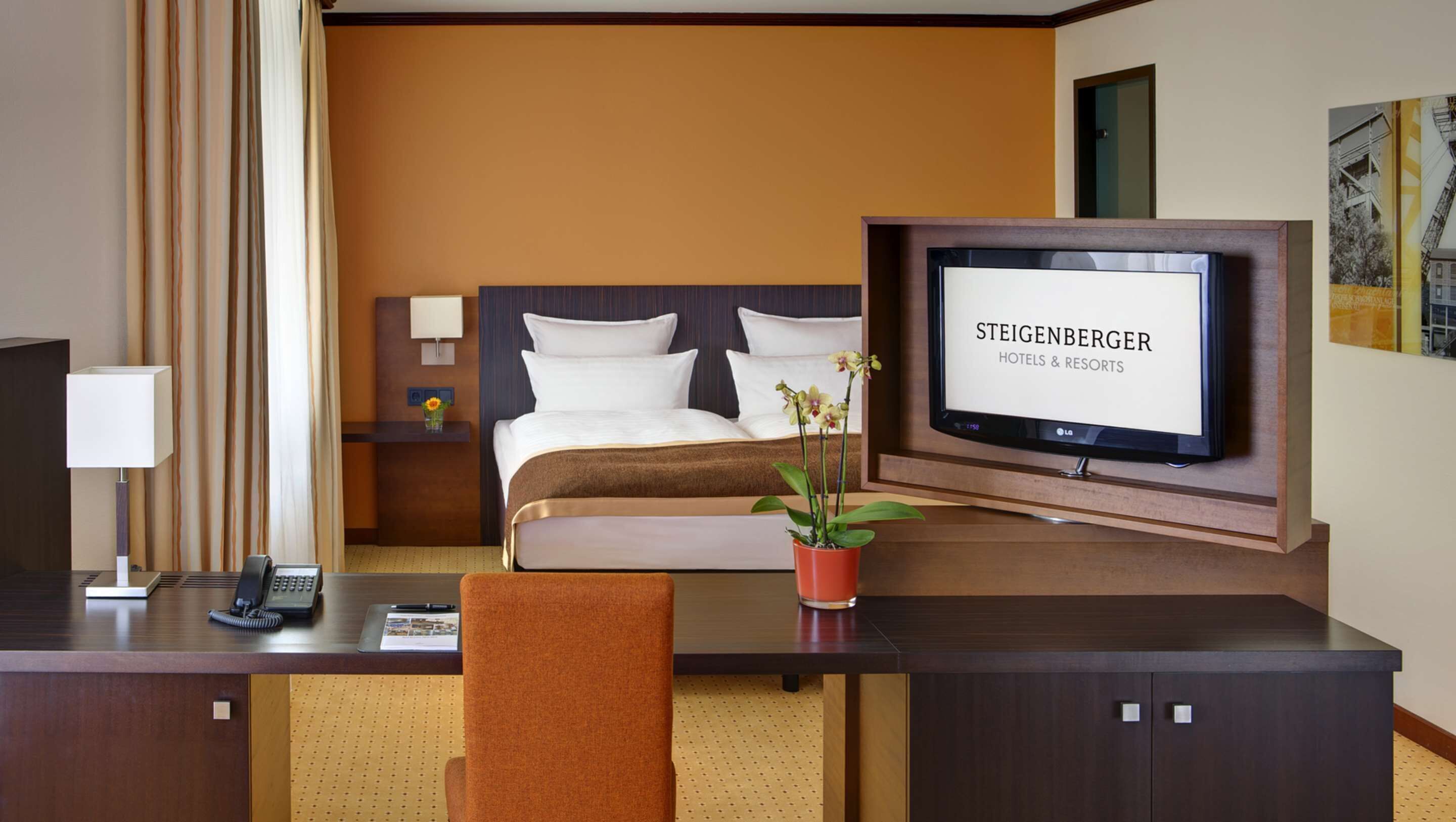 Premium bedding, pillow-top beds, in-room safe, desk