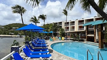 Outdoor pool, pool umbrellas, sun loungers