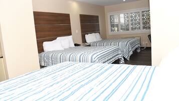 Room, Multiple Beds, Non Smoking | Iron/ironing board, rollaway beds, free WiFi, bed sheets