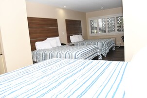 Room, Multiple Beds, Non Smoking | Iron/ironing board, rollaway beds (surcharge), WiFi (free), bed sheets