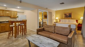 Studio Suite, 1 King Bed, Kitchen | Living area | 32-inch plasma TV with cable channels, TV