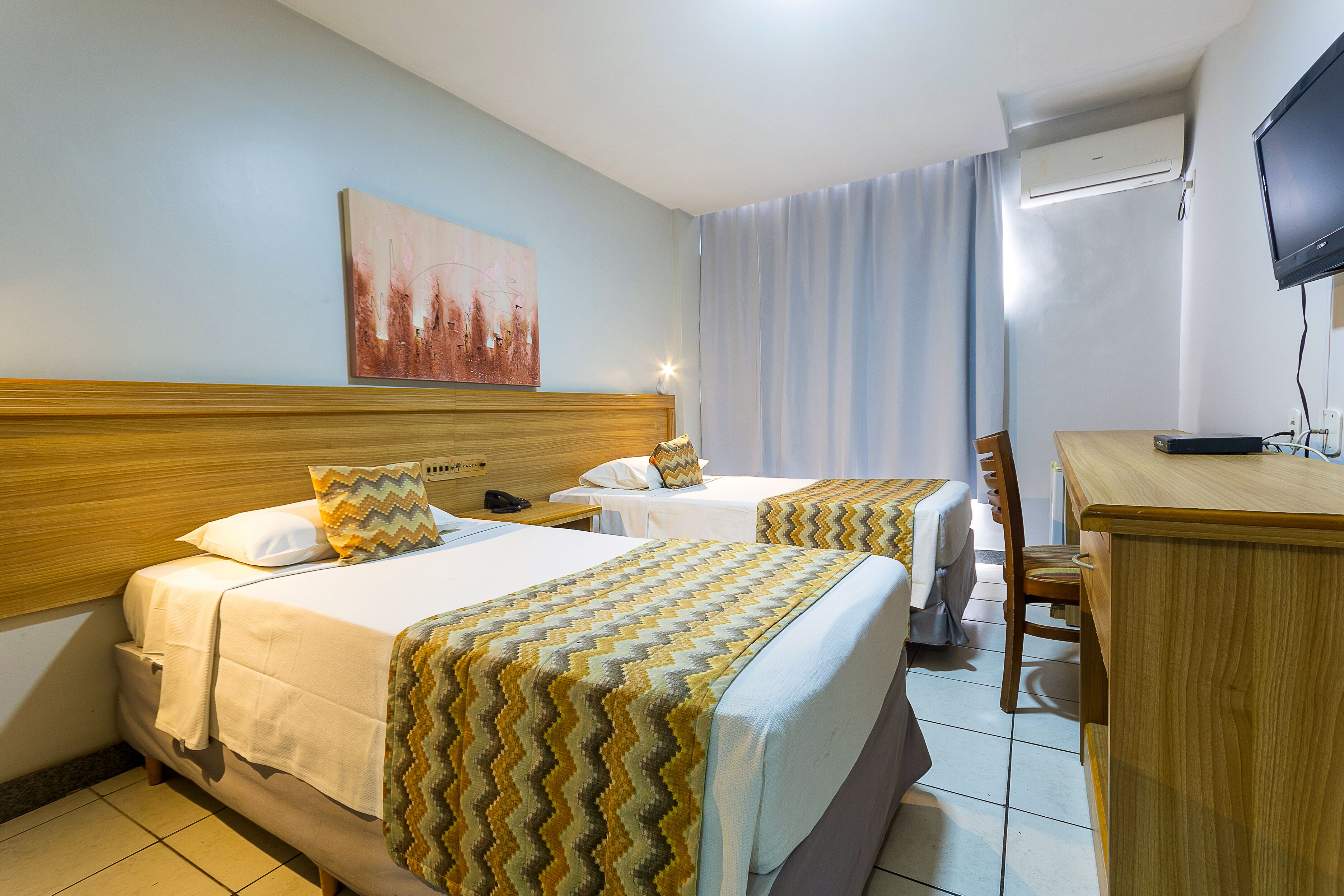 Twin Room, 2 Single Beds | Minibar, in-room safe, free WiFi, bed sheets